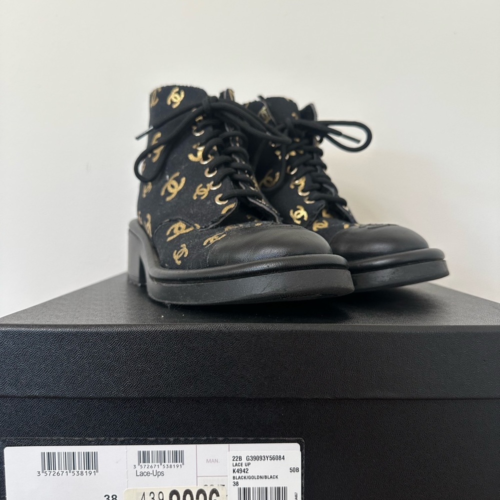 Chanel Black and Gold Logo Boots